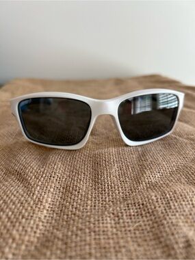Oakley White and  Gray Polarized Canteen Microfiber Sunglasses with Sleeve.